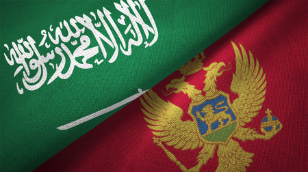 Montenegro and Saudi Arabia flags together relations textile cloth fabric textureの写真素材