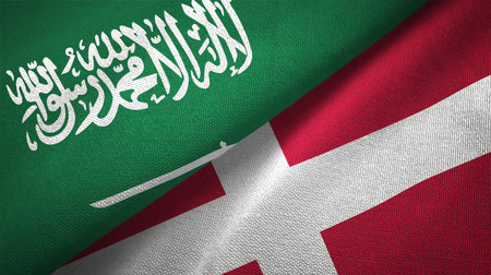 Denmark and Saudi Arabia flags together relations textile cloth fabric textureの写真素材