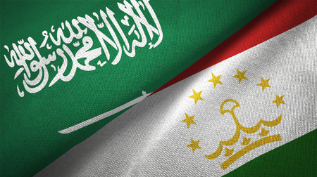 Tajikistan and Saudi Arabia flags together relations textile cloth fabric textureの写真素材