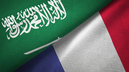 France and Saudi Arabia flags together relations textile cloth fabric textureの写真素材