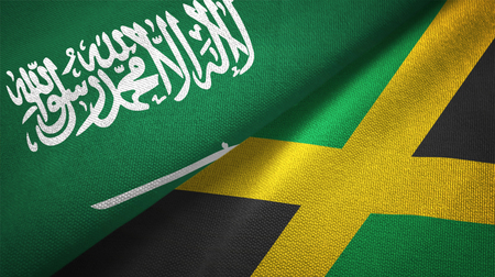 Jamaica and Saudi Arabia flags together relations textile cloth fabric textureの写真素材