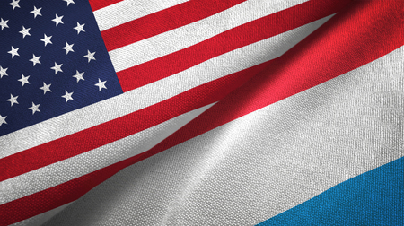 United States and Luxembourg flags together textile cloth, fabric textureの写真素材