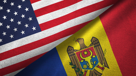 United States and Moldova flags together textile cloth, fabric textureの写真素材