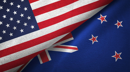 United States and New Zealand flags together textile cloth, fabric textureの写真素材