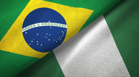 Nigeria and Brazil flags together relations textile cloth fabric textureの写真素材