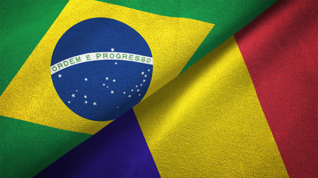 Romania and Brazil flags together relations textile cloth fabric textureの写真素材
