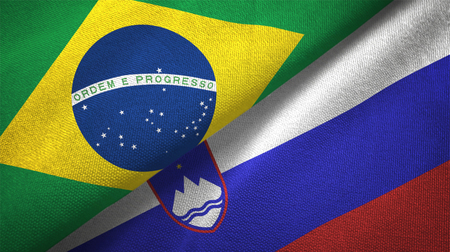 Slovenia and Brazil flags together relations textile cloth fabric textureの写真素材