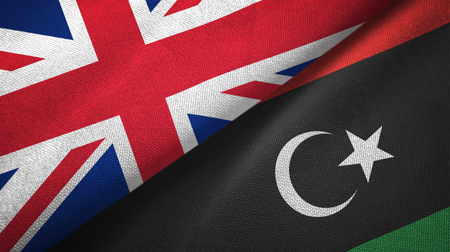 United Kingdom and Libya flags together relations textile cloth, fabric textureの写真素材