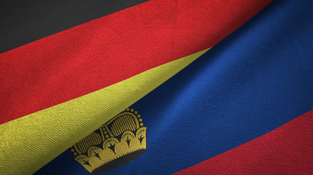Germany and Liechtenstein flags together relations textile cloth, fabric textureの写真素材