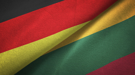 Germany and Lithuania flags together relations textile cloth, fabric textureの写真素材