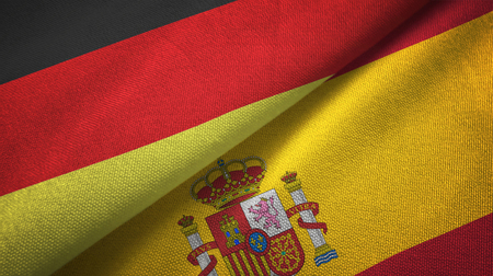 Germany and Spain flags together relations textile cloth, fabric textureの写真素材