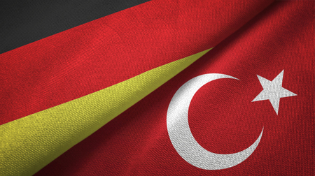 Germany and Turkey flags together relations textile cloth, fabric textureの写真素材