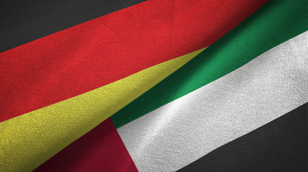 Germany and United Arab Emirates flags together relations textile cloth, fabric textureの写真素材