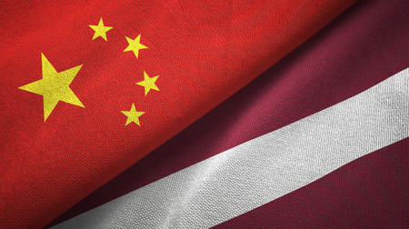 China and Latvia flags together relations textile cloth, fabric textureの写真素材
