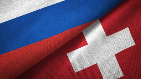 Russia and Switzerland flags together relations textile cloth, fabric textureの写真素材