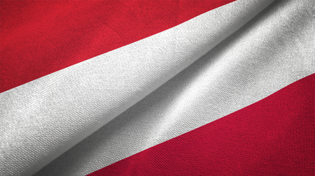 Indonesia and Poland flags together textile cloth, fabric textureの写真素材