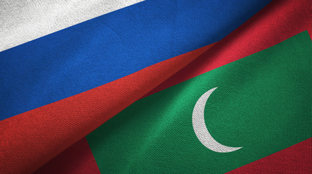 Russia and Maldives two folded flags togetherの写真素材