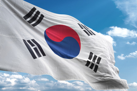 South Korea flag waving blue sky background 3D illustration