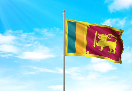 Sri Lanka flag waving blue sky background 3D illustrationの写真素材