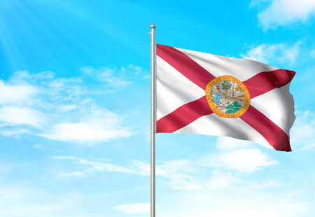 Florida state of United States flag waving blue sky background 3D illustrationの写真素材