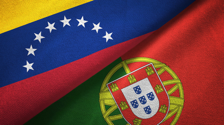 Venezuela and Portugal flags together textile cloth, fabric textureの写真素材
