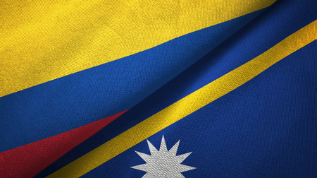 Colombia and Nauru two folded flags togetherの写真素材