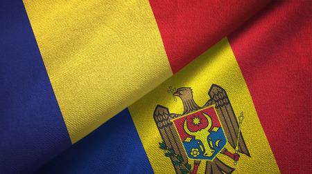 Romania and Moldova flags together textile cloth, fabric textureの写真素材
