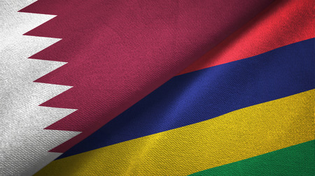 Qatar and Mauritius two folded flags togetherの写真素材