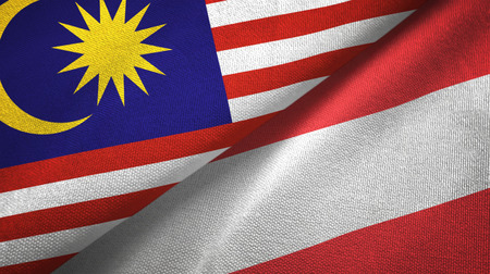Malaysia and Austria flags together textile cloth, fabric textureの写真素材