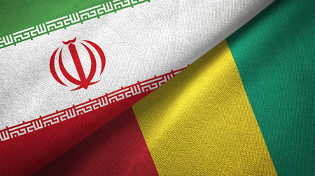 Iran and Guinea two folded flags togetherの写真素材