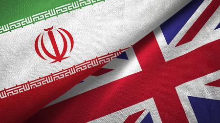 Iran and United Kingdom flags together textile cloth, fabric textureの写真素材