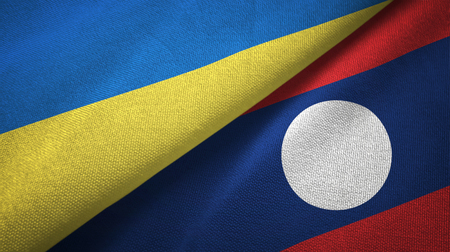 Ukraine and Laos two folded flags togetherの写真素材