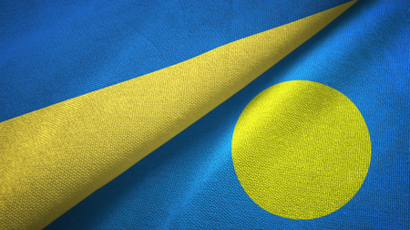 Ukraine and Palau two folded flags togetherの写真素材