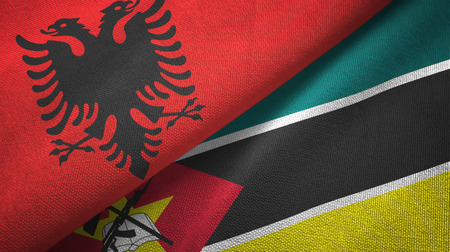 Albania and Mozambique two folded flags togetherの写真素材
