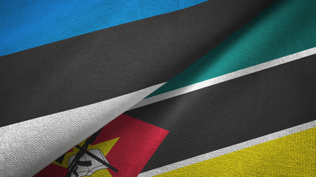 Estonia and Mozambique two folded flags togetherの写真素材