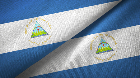 Nicaragua two flags textile cloth, fabric textureの写真素材