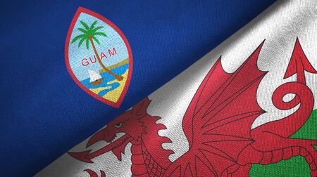Guam and Wales two folded flags togetherの写真素材