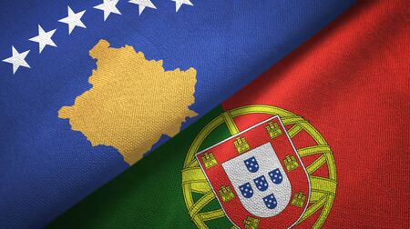 Kosovo and Portugal flags together textile cloth, fabric textureの写真素材