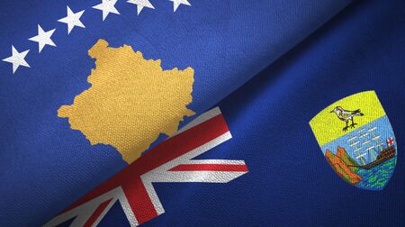 Kosovo and Saint Helena two folded flags togetherの写真素材