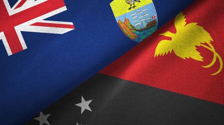 Saint Helena and Papua New Guinea two folded flags togetherの写真素材