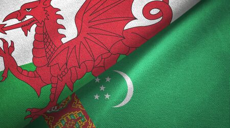 Wales and Turkmenistan flags together textile cloth, fabric textureの写真素材