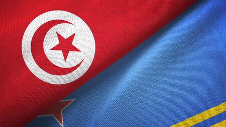 Tunisia and Aruba two folded flags togetherの写真素材