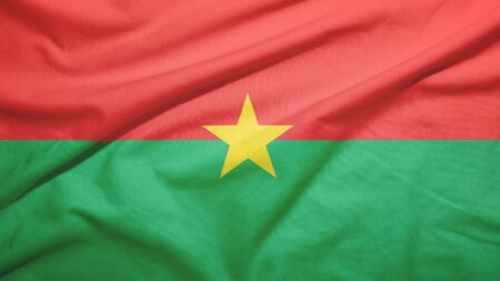 Burkina Faso  waving flag on the fabric textureの写真素材