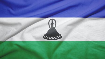 Lesotho waving flag on the fabric texture