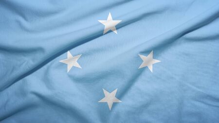 Micronesia waving flag on the fabric textureの写真素材