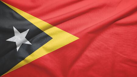 Timor-Leste East Timor waving flag on the fabric textureの写真素材