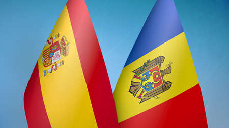 Spain and Moldova two flags together blue backgroundの写真素材