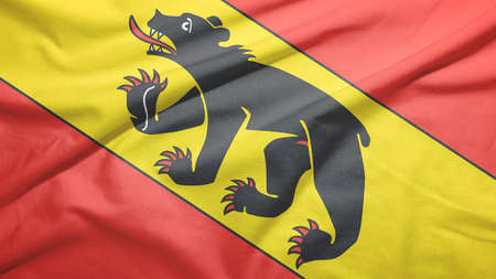 Bern canton of Switzerland flag on the fabric texture backgroundの写真素材