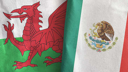Mexico and Wales two flags textile cloth 3D renderingの写真素材