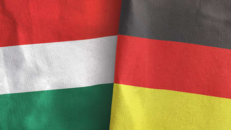 Germany and Hungary two flags textile cloth 3D renderingの写真素材